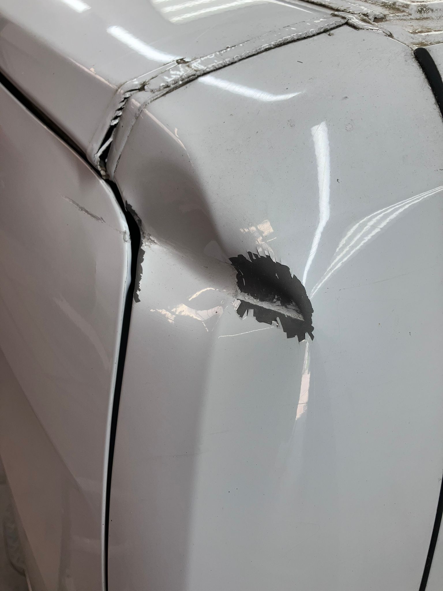 Verhulst Repair - plaatwerk bovenhoek bestelwagen